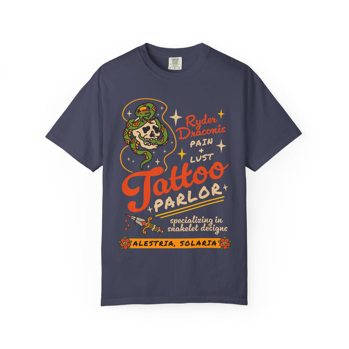 Comfort Colors graphic tee from thtgrlreads featuring a vintage puff print of a skull entwined by a snake and bold text referencing Ryder Draconis, part of Ruthless Boys of the Zodiac collection.