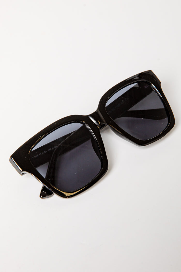 Black sunglasses on a white background