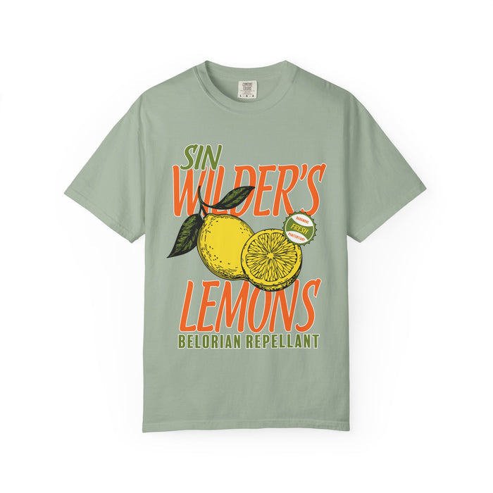 A vintage wash Comfort Colors graphic tee from thtgrlreads featuring bold orange and green print with lemon artwork and "Sin Wilder's Lemons Belorian Repellant" text, from Darkmore Penitentiary collections.