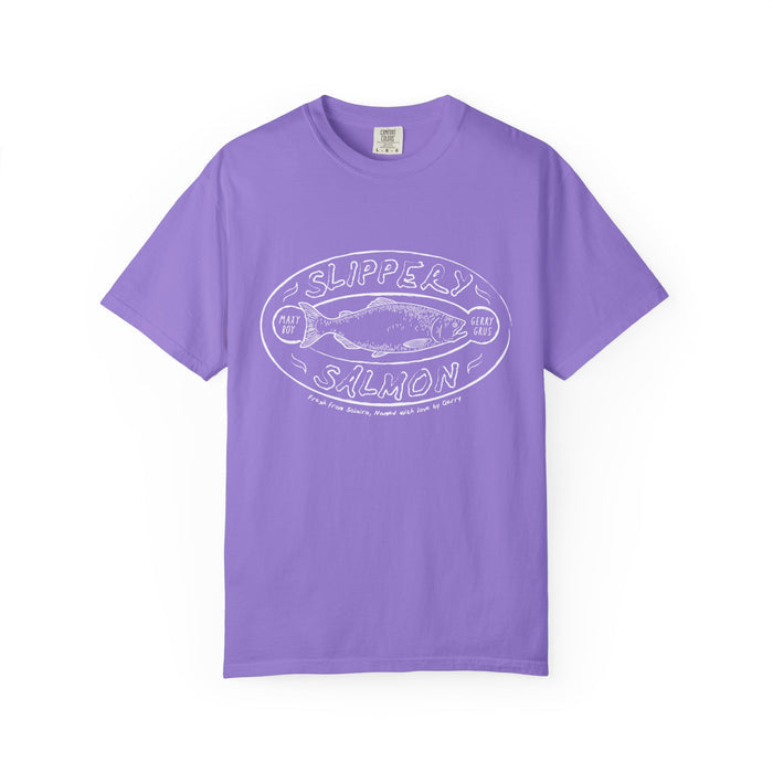 A vintage-wash Comfort Colors graphic tee by thtgrlreads from the Zodiac Academy collection, featuring a whimsical white “Slippery Salmon” print on a soft lavender base.