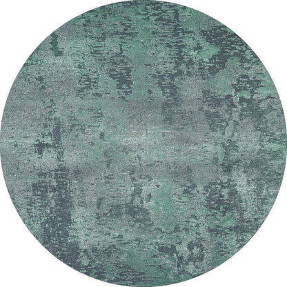 The Smokey Mountains - Washable Rug - JR1631 features an oval shape and textured pattern in green and gray tones, resembling a weathered painted surface—perfect for high-traffic areas.