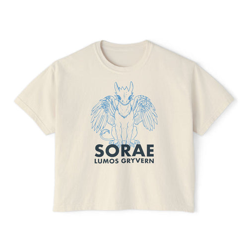 thtgrlreads Kindred's Curse Saga cream-colored Comfort Colors cropped t-shirt featuring a vintage-style blue line drawing of a gryvern with wings and bold text beneath, offered by Printify in the Tees collection.