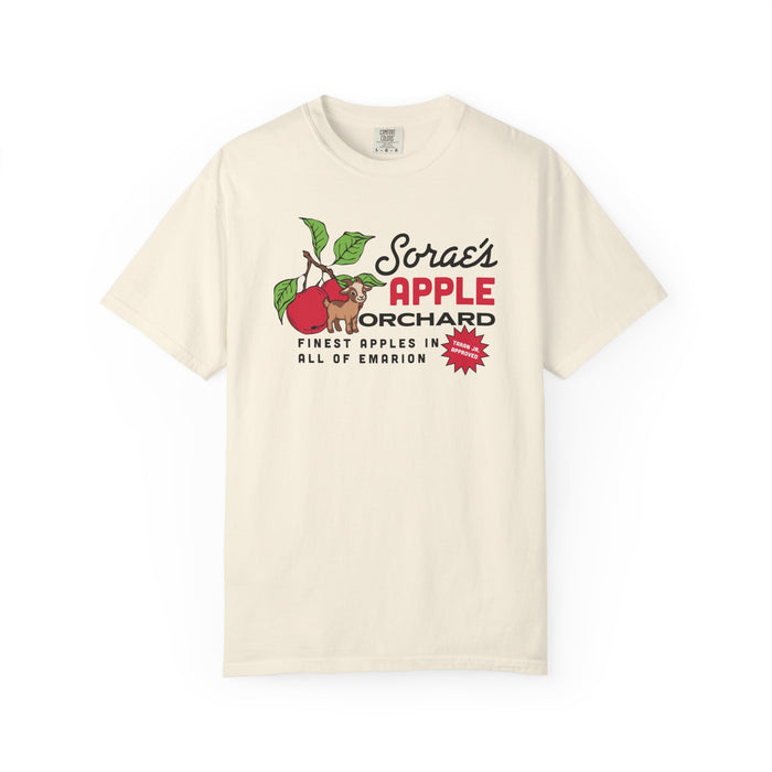 thtgrlreads comfort colors graphic tee featuring vintage-style print of Sorae’s Apple Orchard with red apples and a small brown dog, referencing a fictional Emarion setting.