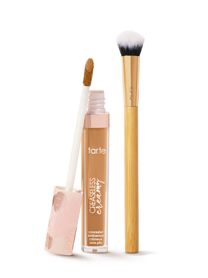 tarte creaseless creamy concealer with brush on a white background