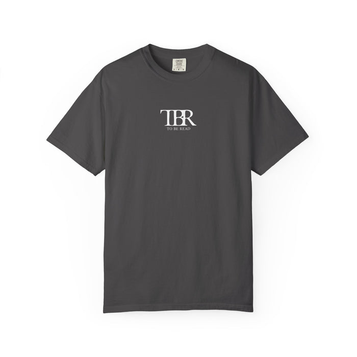 Thtgrlreads Comfort Colors graphic tee from The Life of a Book Bestie collection featuring a minimalist "TBR To Be Read" vintage wash design in white text on soft charcoal fabric.