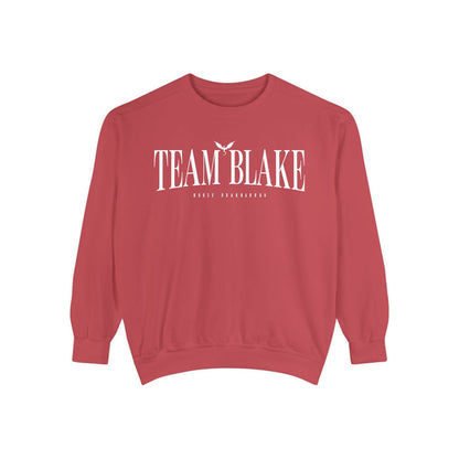Bloodwing Academy crewneck sweatshirt by thtgrlreads featuring "Team Blake" vintage puff print text on a soft, vintage-washed Comfort Colors oversized unisex crewneck.
