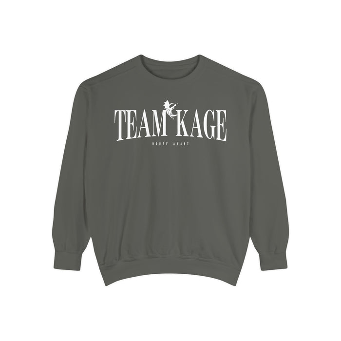 Bloodwing Academy crewneck sweatshirt from thtgrlreads featuring a vintage-wash, soft gray Comfort Colors fabric with bold white "TEAM KAGE" text and a small graphic print.