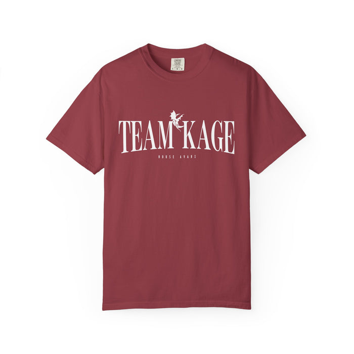 Comfort Colors graphic tee by thtgrlreads featuring Bloodwing Academy from the official collection, in a vintage-washed deep red with bold white "Team Kage" text and a small dragon graphic.