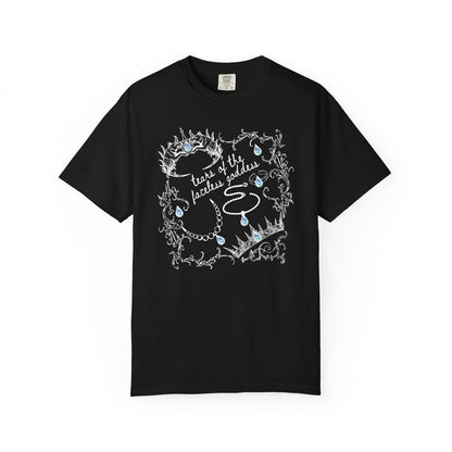 Thtgrlreads Wolves of Ruin collection black Comfort Colors graphic tee by Printify featuring vintage wash and a white and blue vintage puff print design with crowns and teardrops.