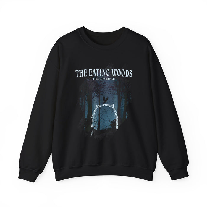 An officially licensed black oversized crewneck sweatshirt from thtgrlreads featuring The Eating Woods collection, with a vintage-style forest graphic and text print on Comfort Colors fabric.