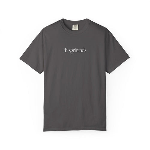 Thtgrlreads officially licensed thisgrlreads Tee from the Book Bestie collection, a vintage wash Comfort Colors graphic tee with minimalist text in a relaxed unisex fit.