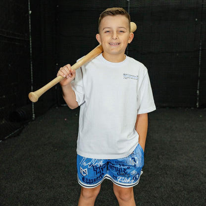 Youth model wearing blue Time 2 Shine Icons Court youth shorts