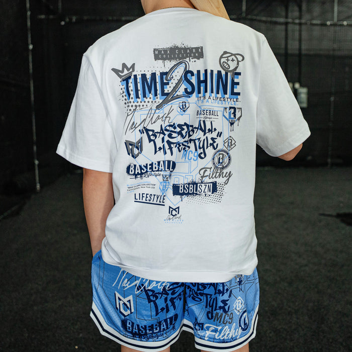 Youth model wearing blue Time 2 Shine Icons Court youth shorts