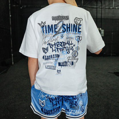 Youth model wearing blue Time 2 Shine Icons Court youth shorts