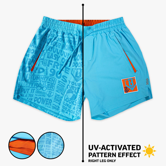 Blue youth shorts with "UVChangeup Trash Talk" design - front view