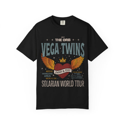Comfort Colors graphic tee from thtgrlreads featuring a vintage wash black base with a bold retro-style "Vega Twins" winged heart and crown print, part of the Zodiac Academy collection.
