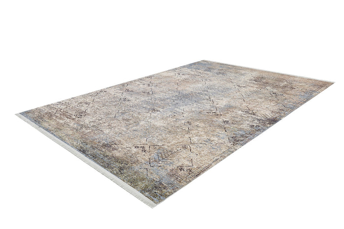 The Windowpane Trellis Washable Rug (JR1663) is a large, rectangular rug with a faded beige, blue, and brown distressed pattern. Its subtle geometric and floral designs with fringed short edges make it ideal for high-traffic areas.
