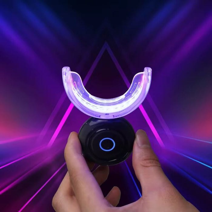 LED teeth whitening kit with wireless mouthpiece and whitening pens for at-home teeth whitening.