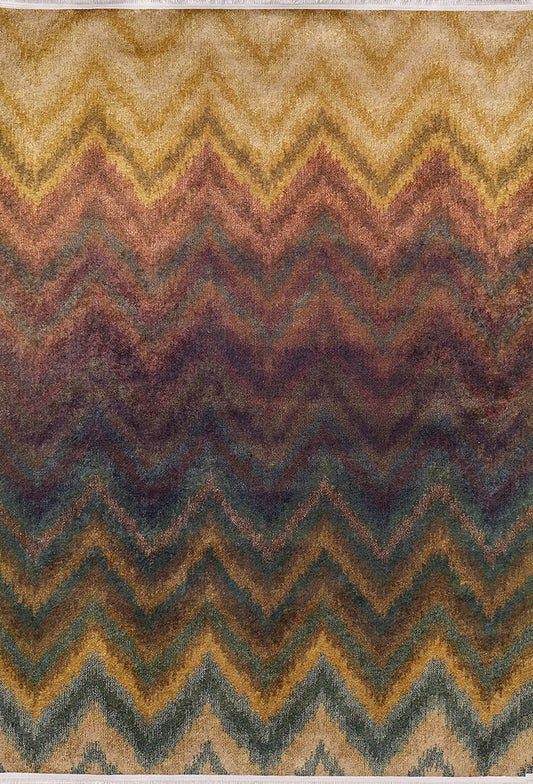 The Zigzag Runway - Washable Rug - JR388 features a textured chevron pattern in earthy zigzag stripes—yellow, gold, brown, burgundy, green, and blue—that blend from light to dark shades, ideal for high-traffic areas.